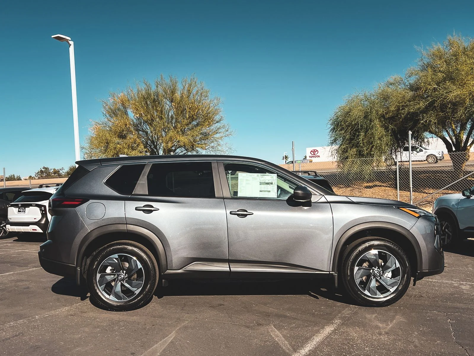 New 2026 Gun Metallic Nissan SV image 2