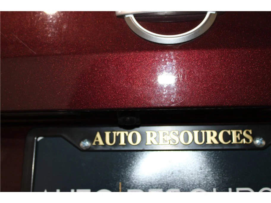 Used 2025 Garnet Pearl Metallic Nissan SV image 18