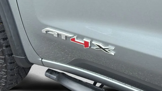 Used 2023 Silver GMC AT4X image 40