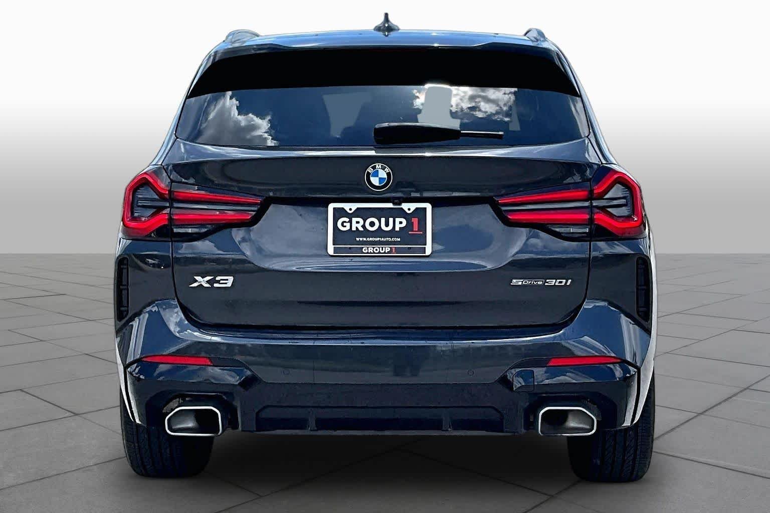 Used 2024 Dark Graphite Metallic BMW sDrive30i image 4