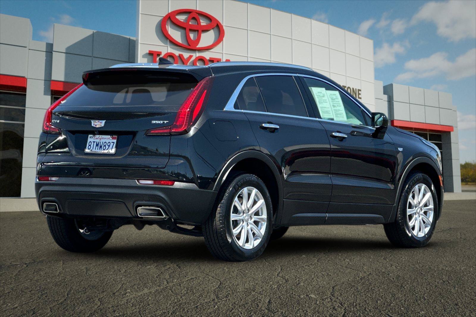 Used 2021 Stellar Black Metallic Cadillac FWD Luxury image 3