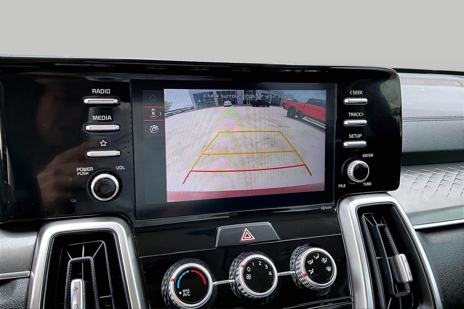 Used 2022 Passion Red Tintcoat Kia LX image 16