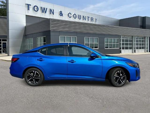 Used 2025 Electric Blue Metallic Nissan SV image 2
