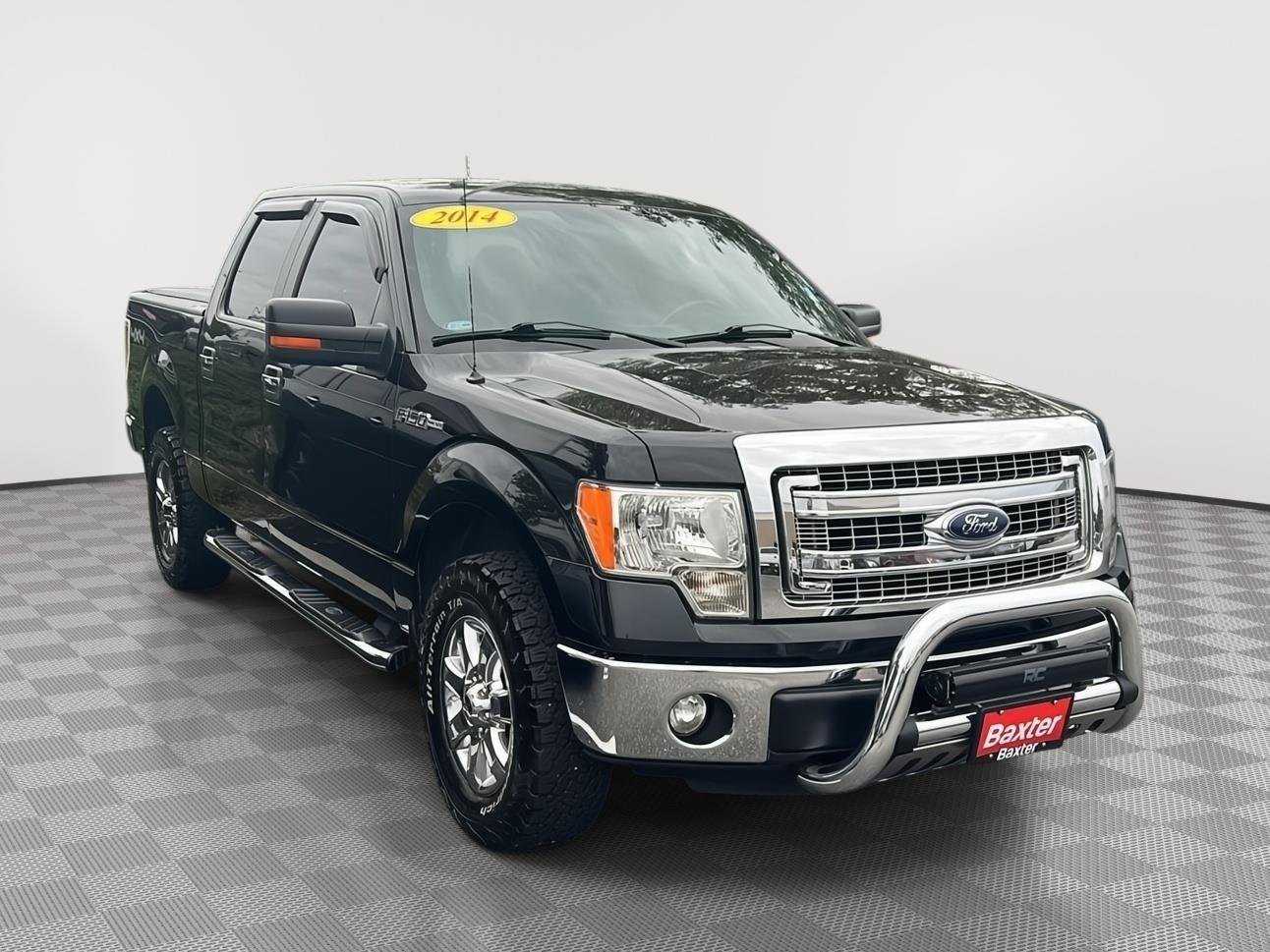 Used 2014 Tuxedo Black Metallic Ford XLT image 1