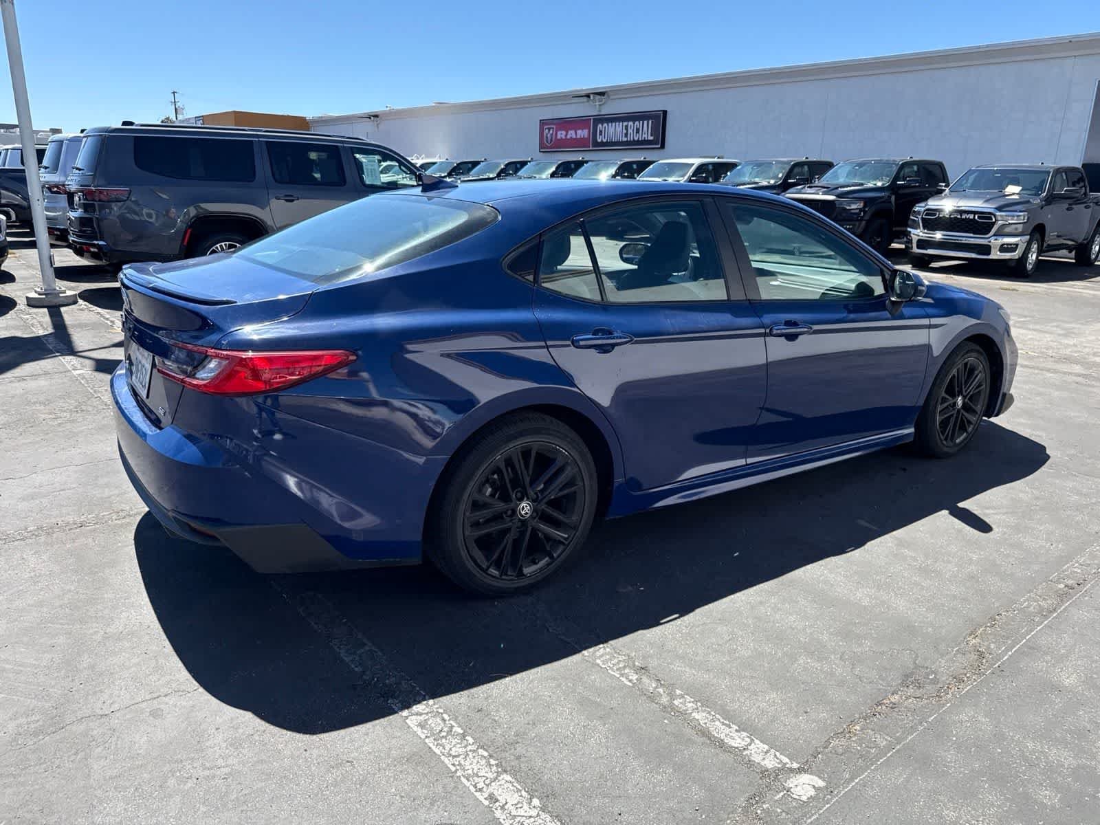 Used 2025 Reservoir Blue Toyota SE image 13