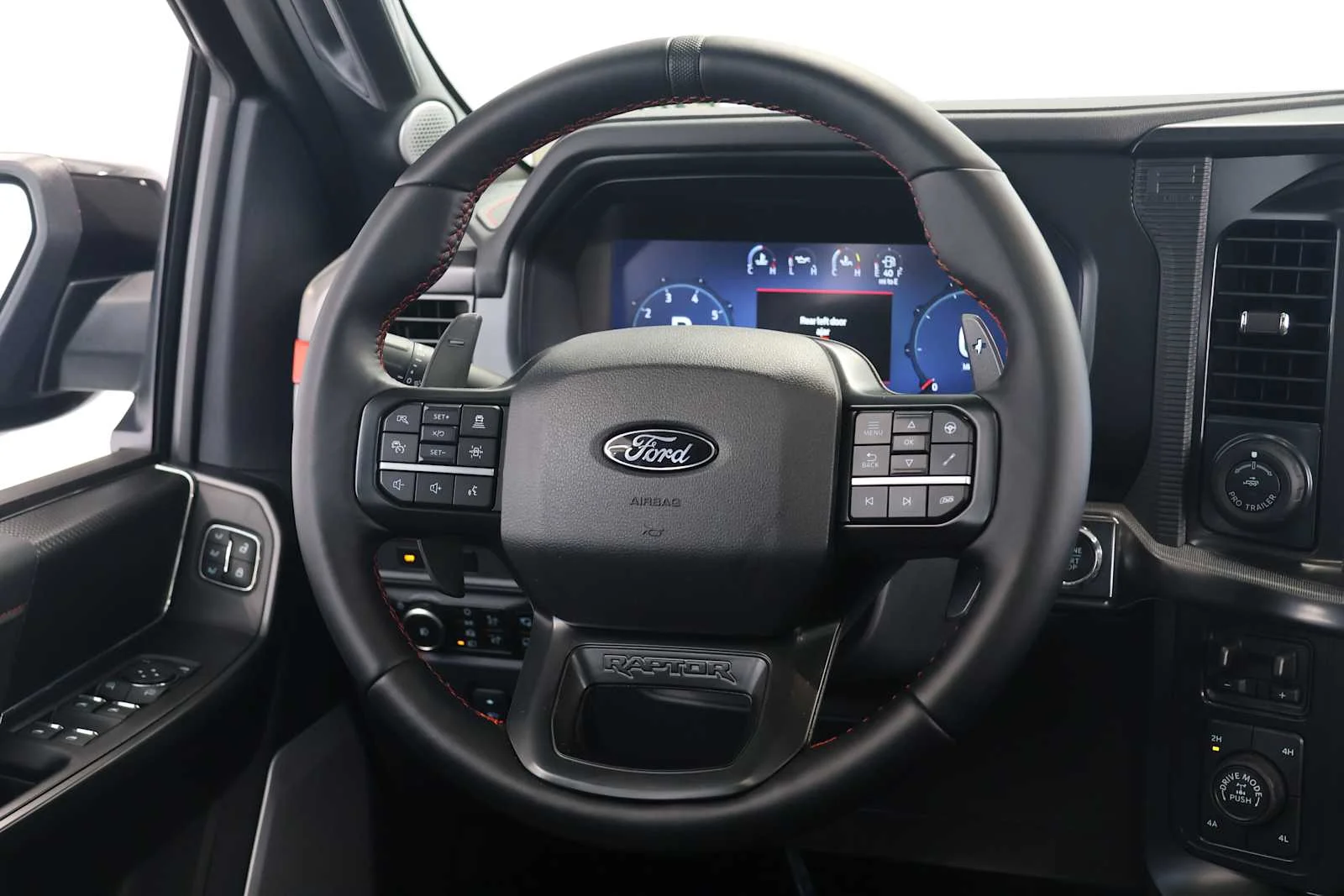 Used 2025 Agate Black Metallic Ford Raptor image 26