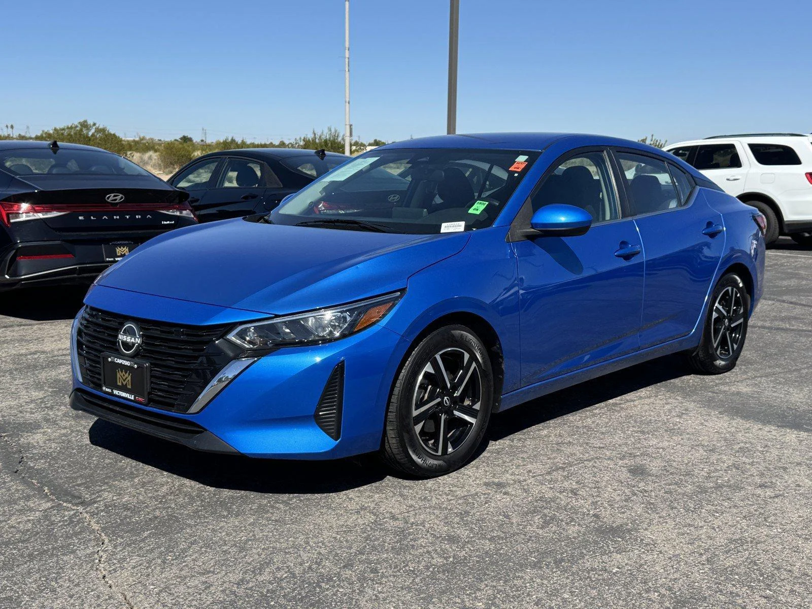 Used 2024 Electric Blue Met Nissan SV image 3