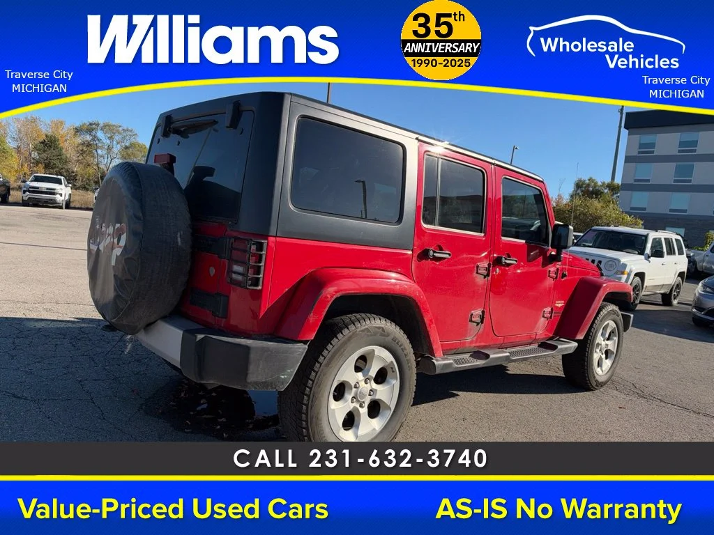 Used 2013 Flame Red Jeep Unlimited Sahara image 4