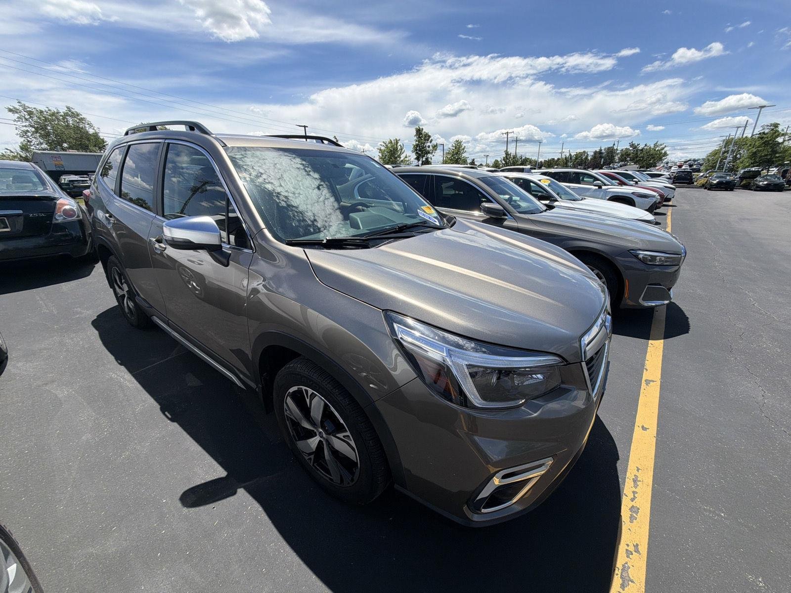 Used 2021 Sepia Bronze Metallic Subaru Touring image 1