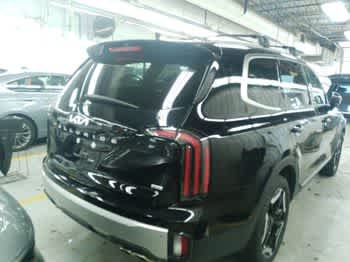 Used 2024 Ebony Black Kia EX image 3