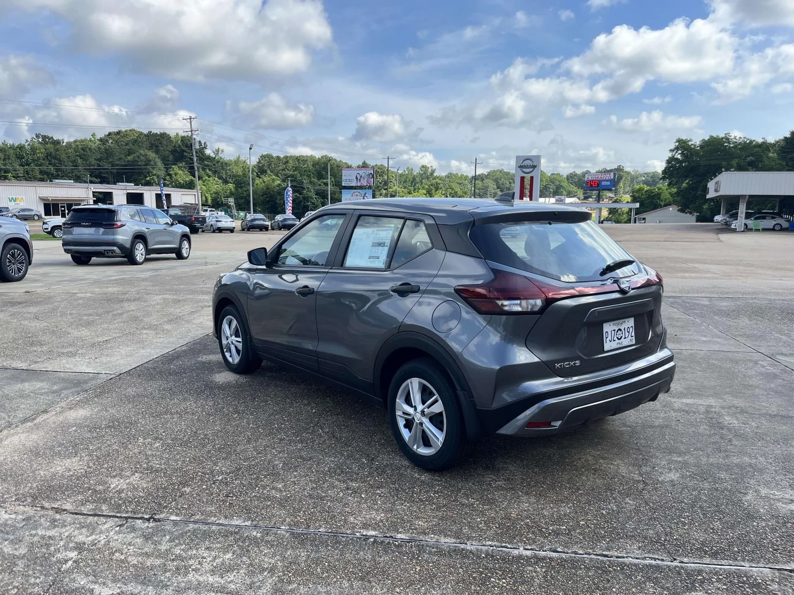 Used 2025 GUN METALLIC Nissan S FWD image 5