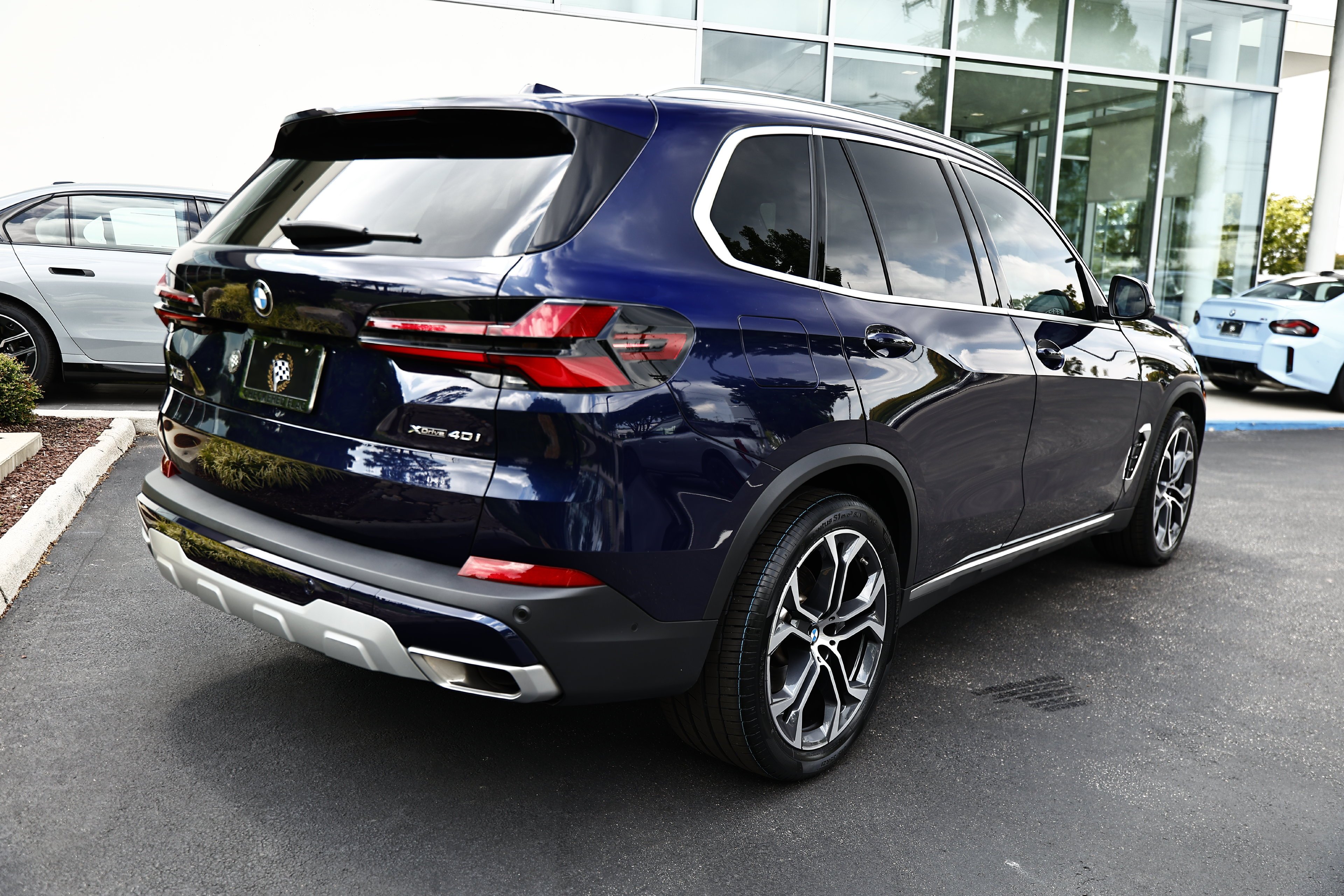 Certified Used 2025 Tanzanite Blue II Metallic BMW xDrive40i image 7