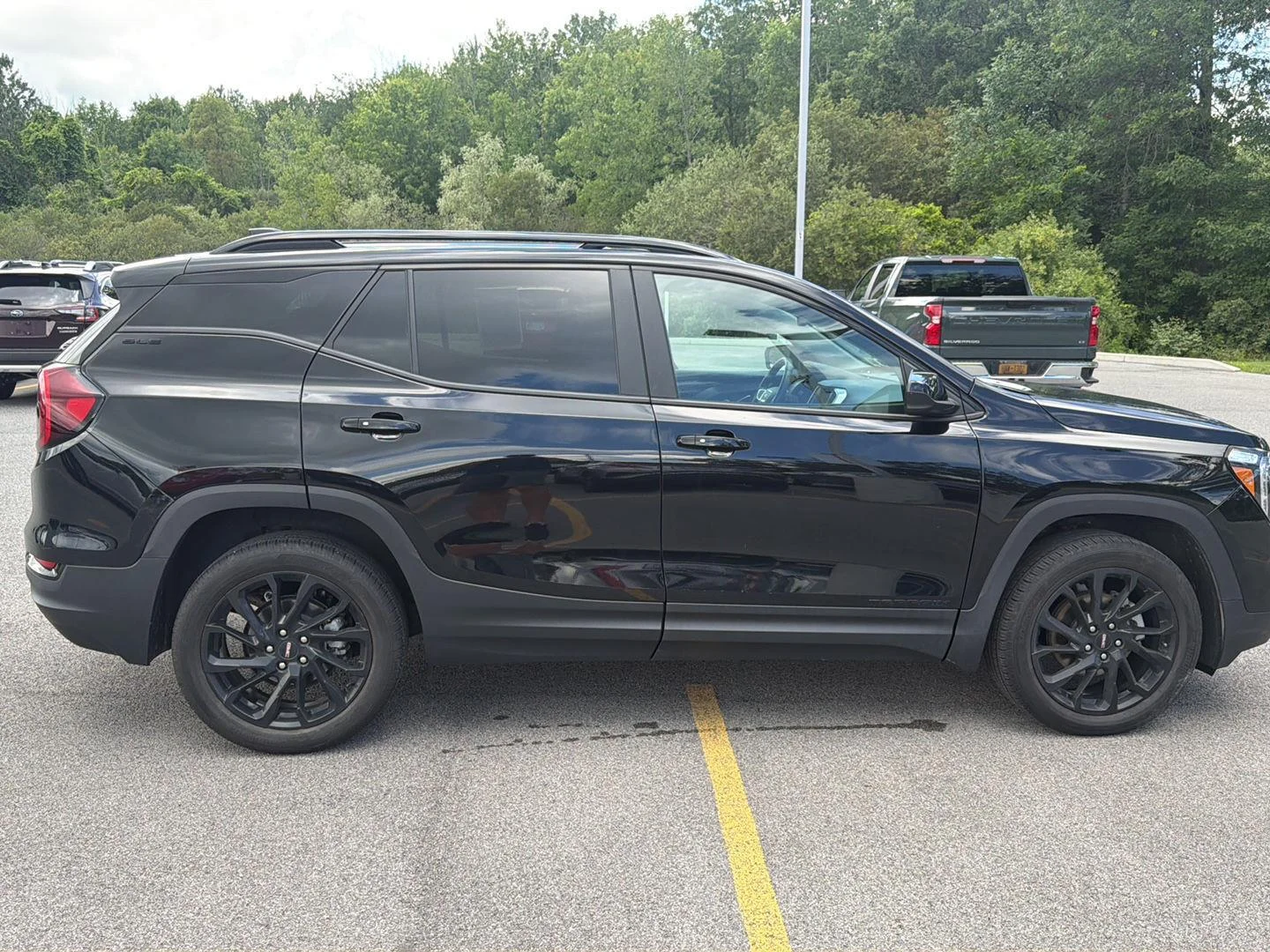 Used 2023 Ebony Twilight Metallic GMC SLE image 3
