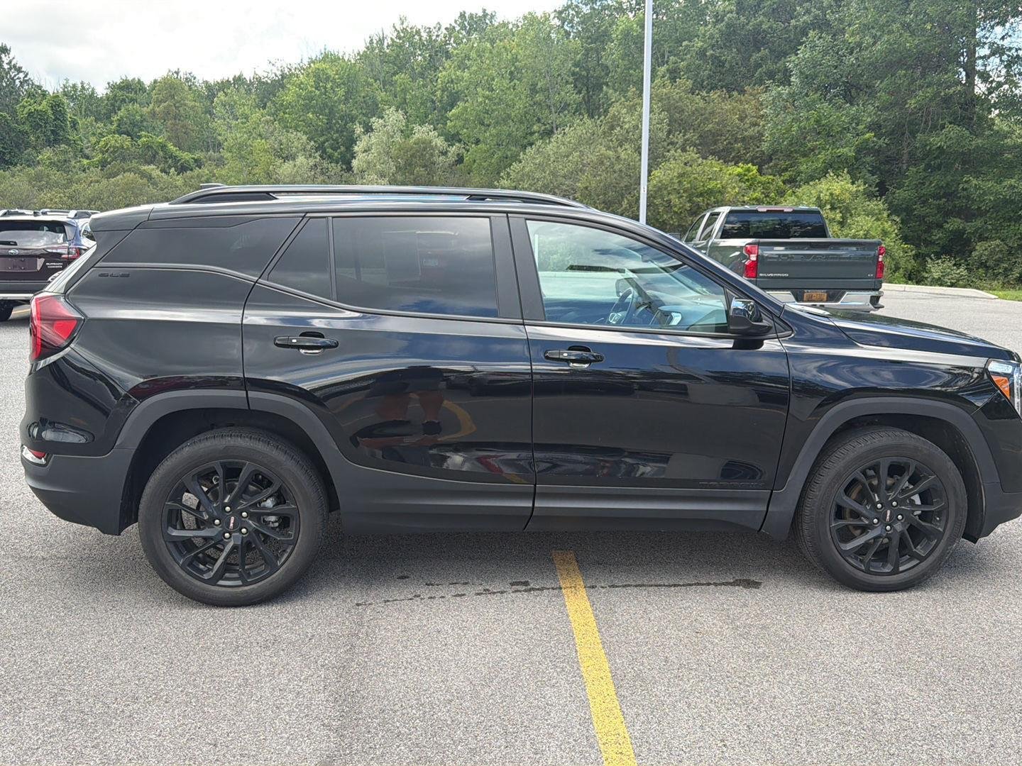 Used 2023 Ebony Twilight Metallic GMC SLE image 3