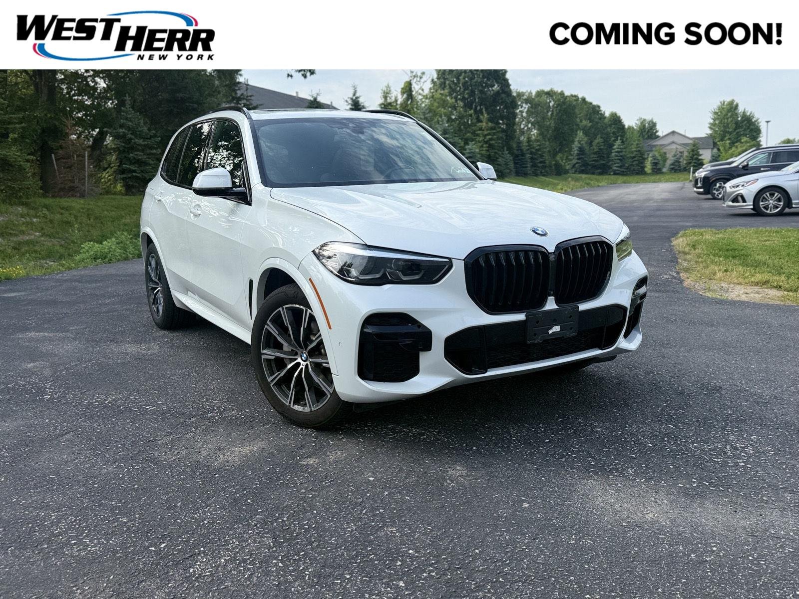 Used 2022 Mineral White Metallic BMW xDrive40i image 1