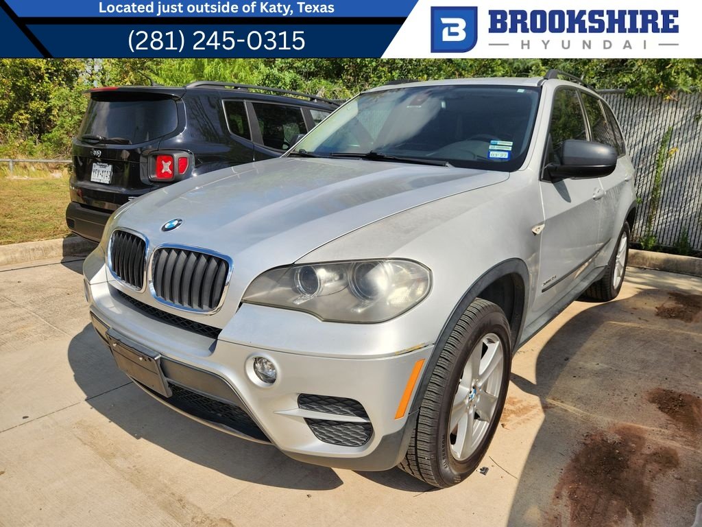 Used 2013 Titanium Silver Metallic BMW xDrive35i Sport Activity image 1
