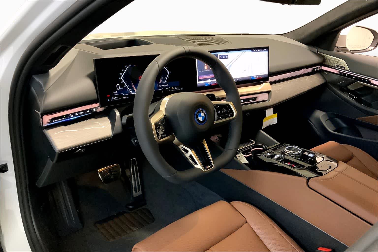 New 2026 Mineral White Metallic BMW 550e xDrive image 8