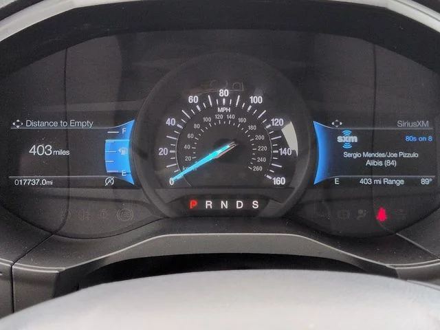 Used 2024 White Metallic Ford Titanium image 28