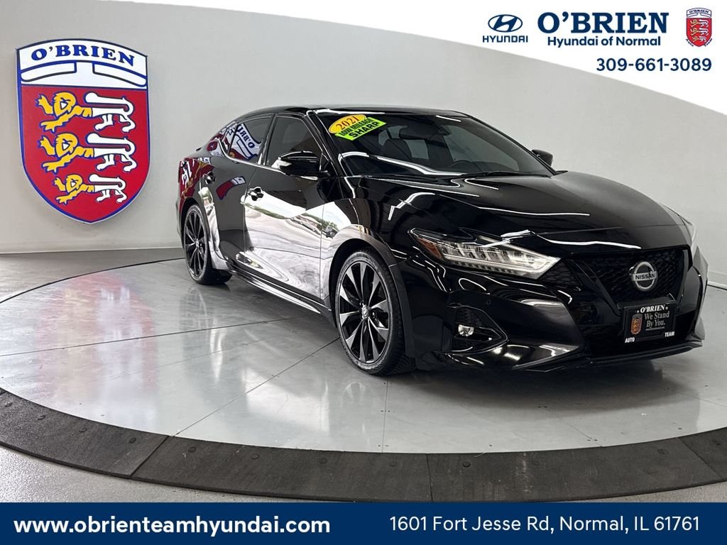 Used 2021 Super Black Nissan SR image 1