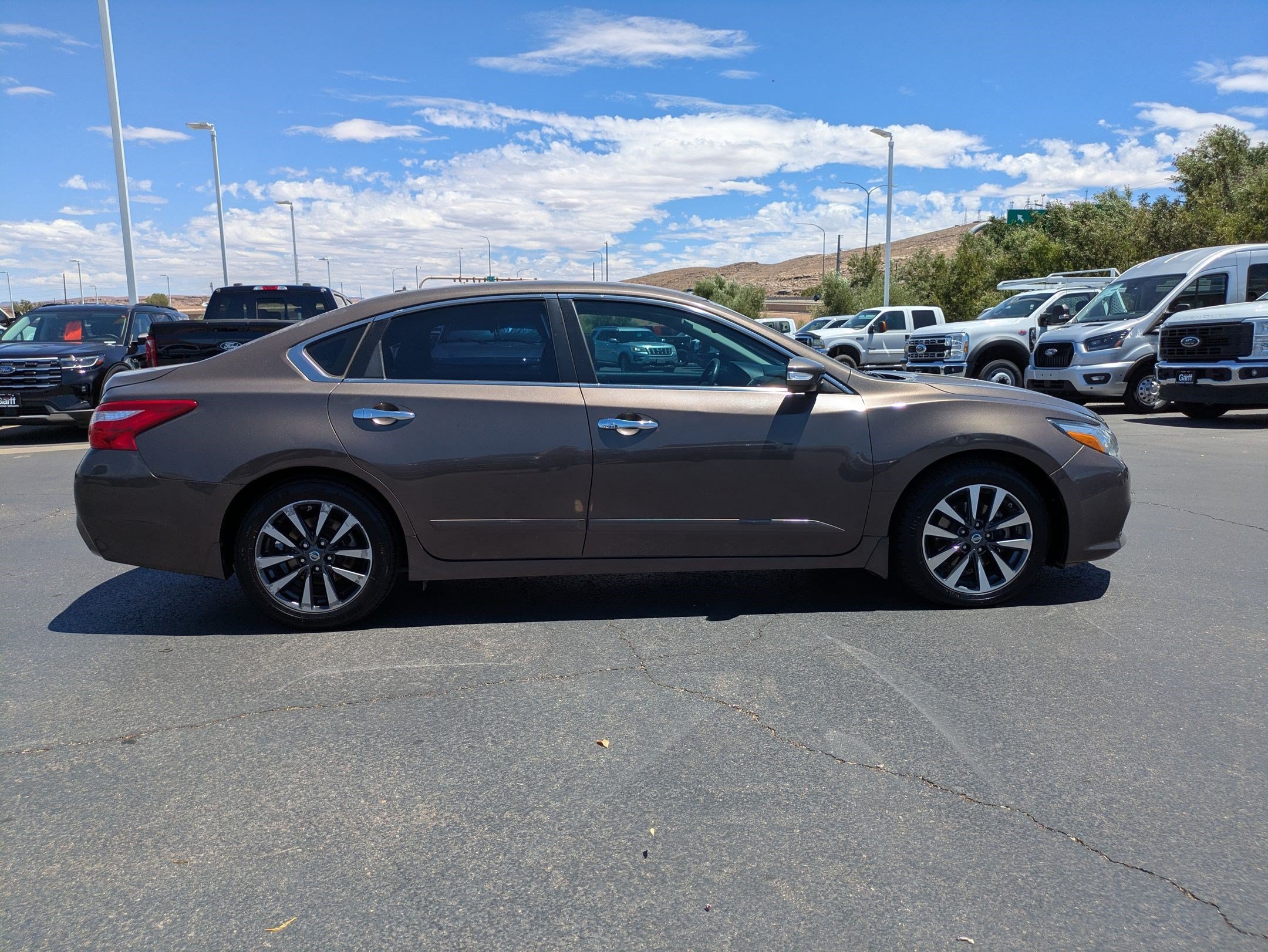 Used 2016 Nissan Altima SV with VIN 1N4AL3APXGC133338 for sale in St. George, UT