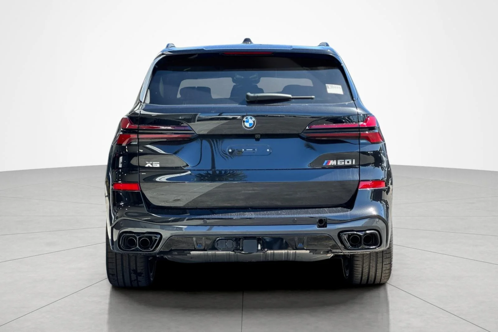 New 2026 Black Sapphire Metallic BMW M60i image 4