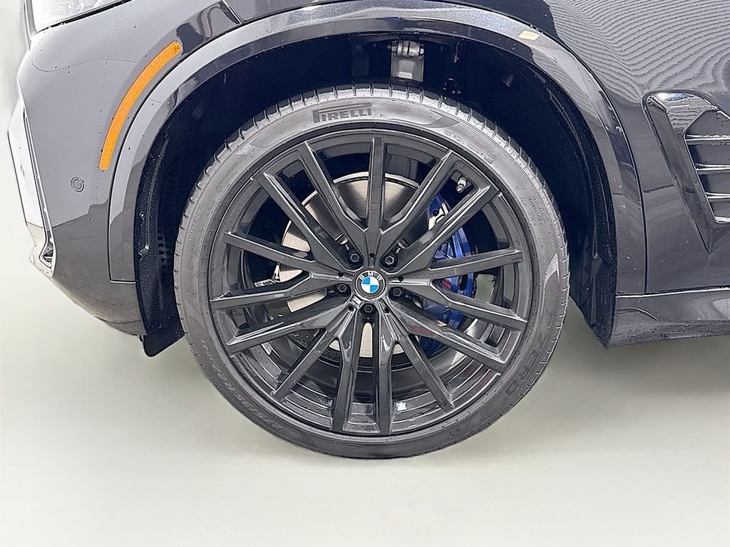 Certified Used 2025 Black Sapphire Metallic BMW xDrive40i image 2