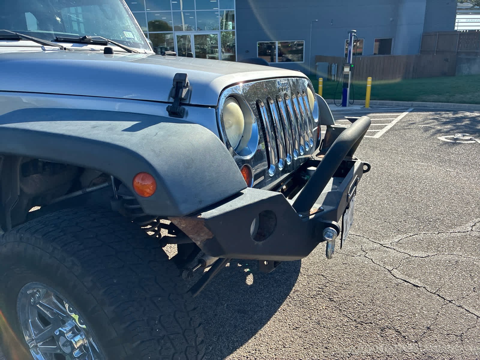 Used 2012 Bright Silver Metallic Jeep Sport image 5