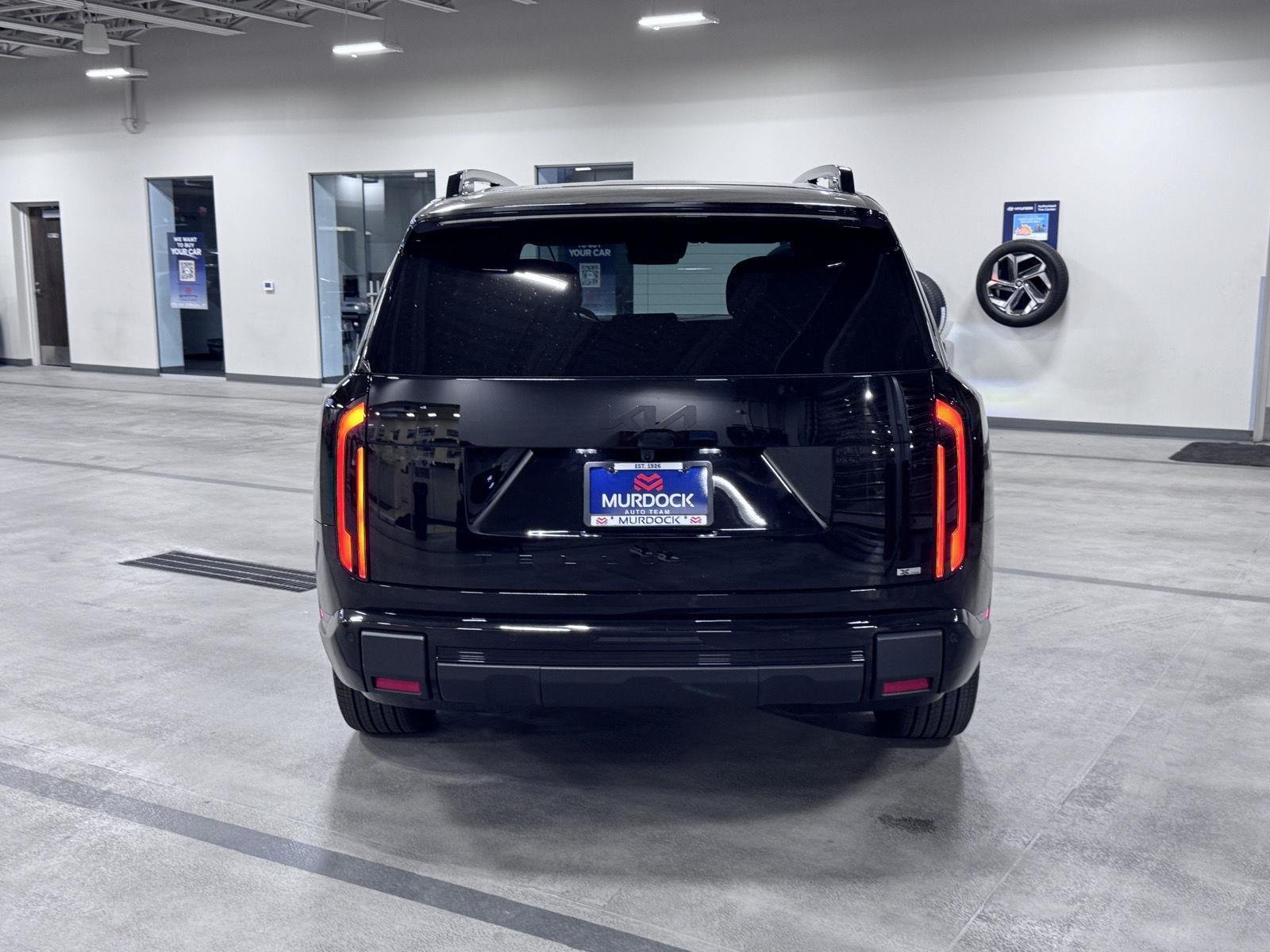 Used 2027 Ebony Black Kia X-Line EX image 5