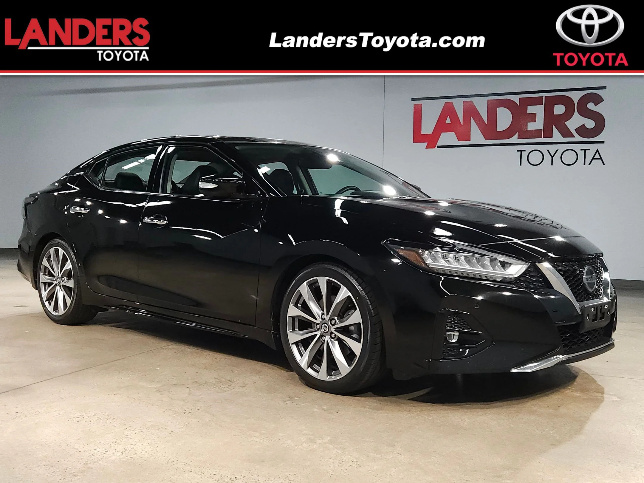 Used 2020 Super Black Nissan Platinum image 1