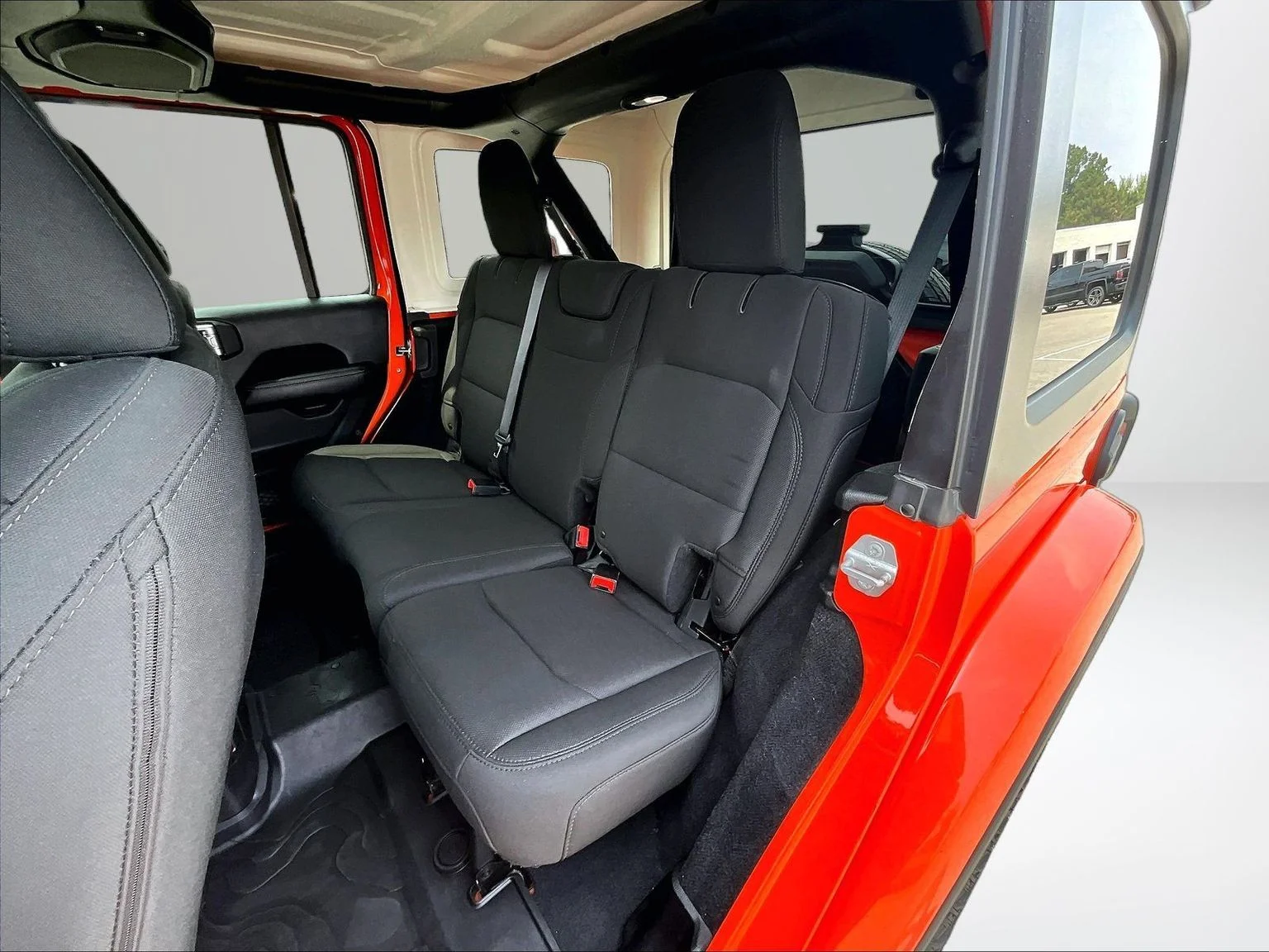 Used 2018 Orange Jeep Unlimited Sahara image 27