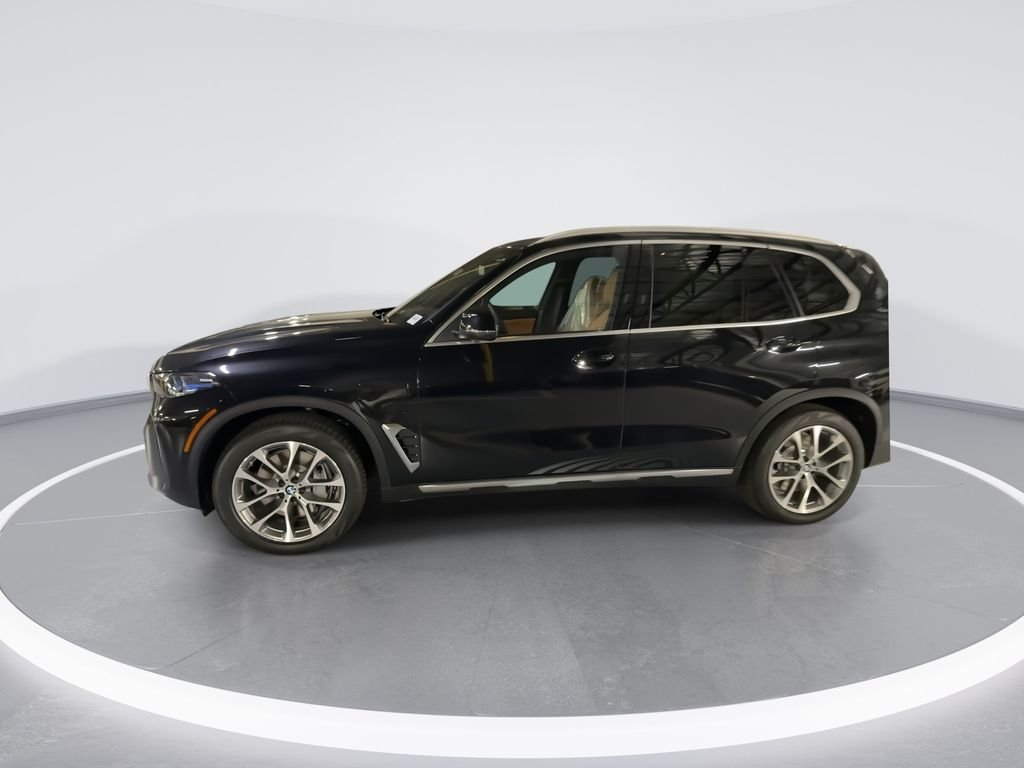 New 2026 Black Sapphire Metallic BMW xDrive50e image 5