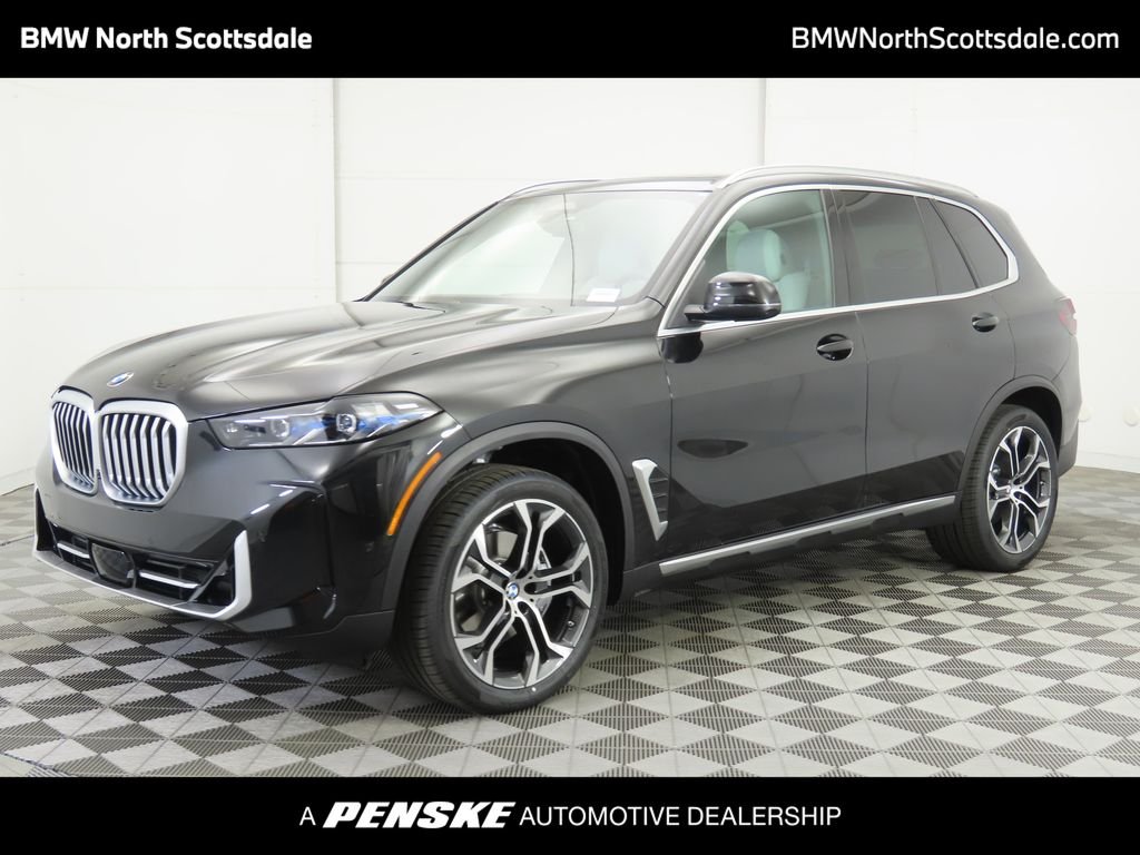 Certified Used 2026 Black Sapphire Metallic BMW sDrive40i image 1