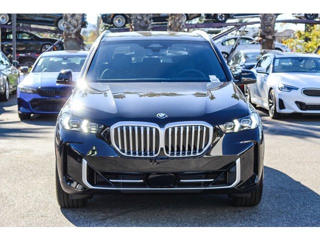 New 2026 Black Sapphire Metallic BMW xDrive50e image 2