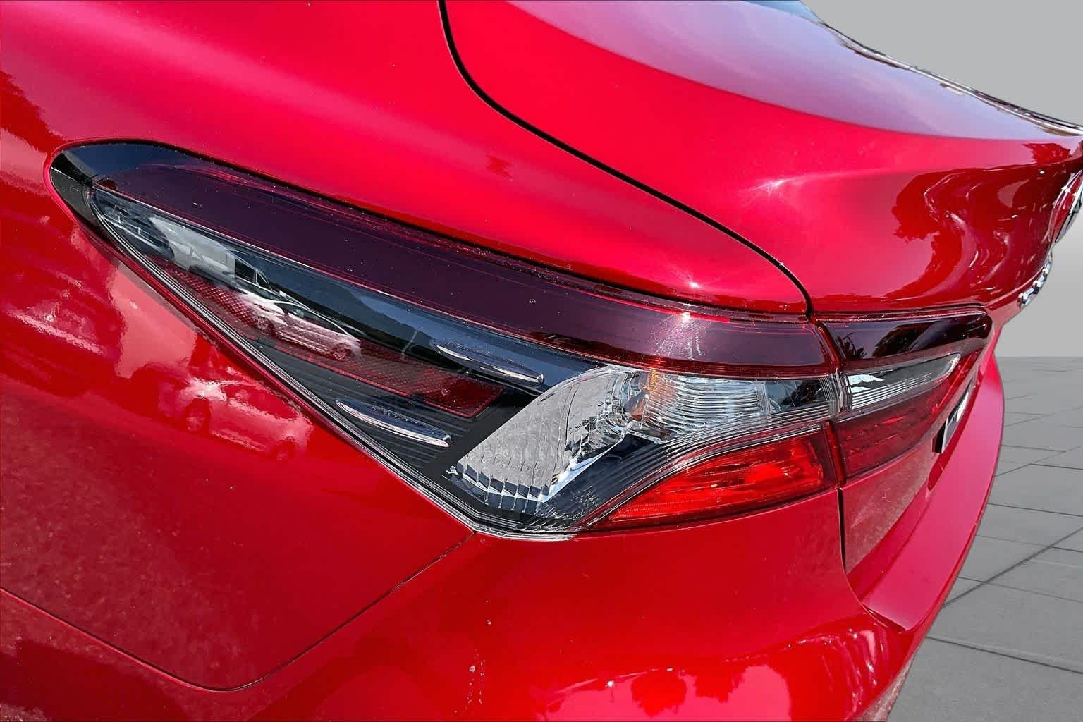 Used 2023 Supersonic Red Toyota LE image 28