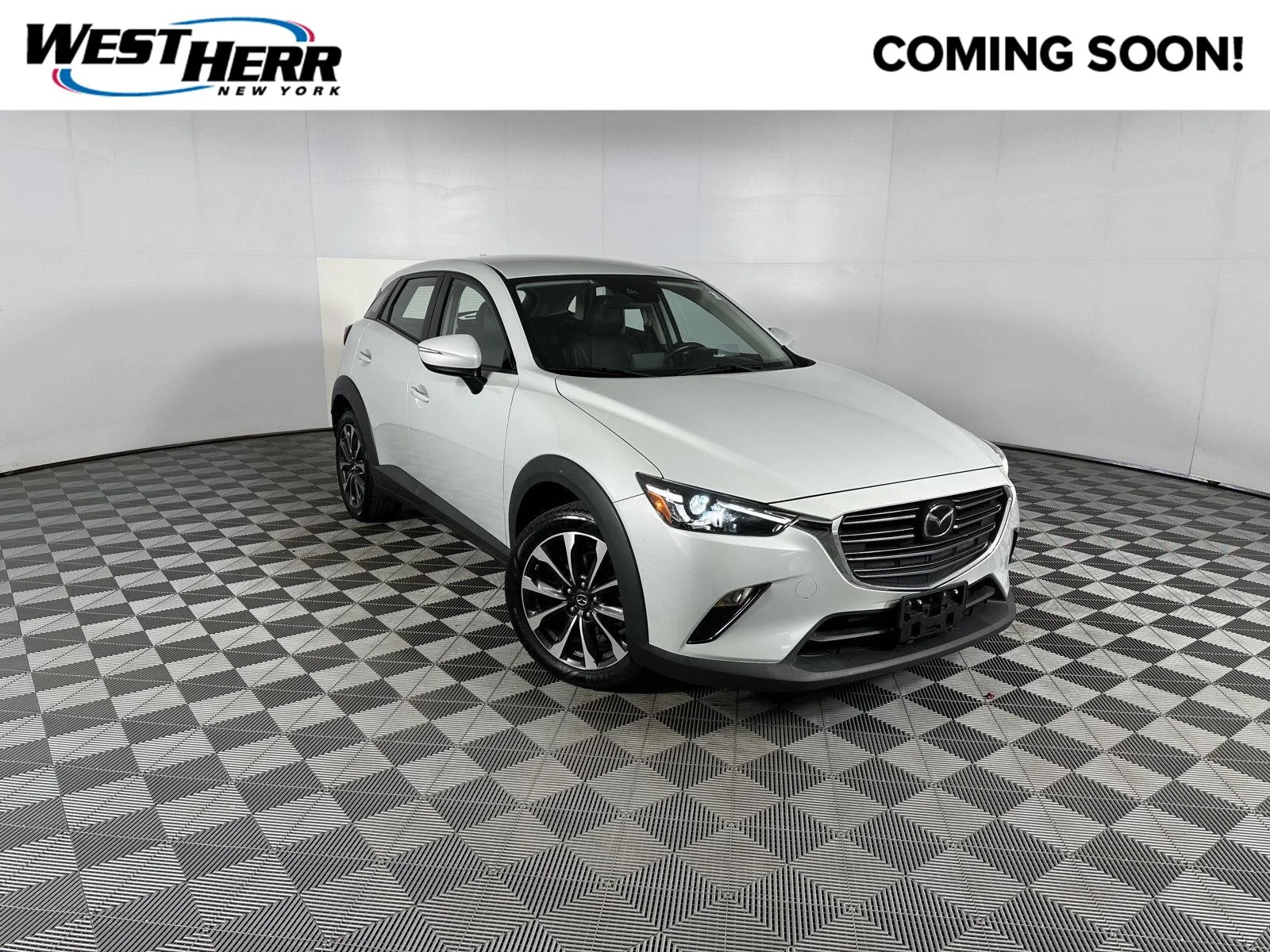 Used 2019 Ceramic Metallic Mazda Touring image 1