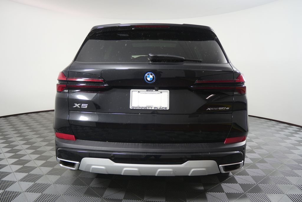 New 2026 Black Sapphire Metallic BMW xDrive50e image 5
