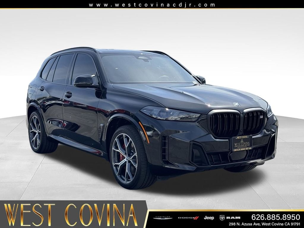 Used 2026 Black BMW M60i image 1