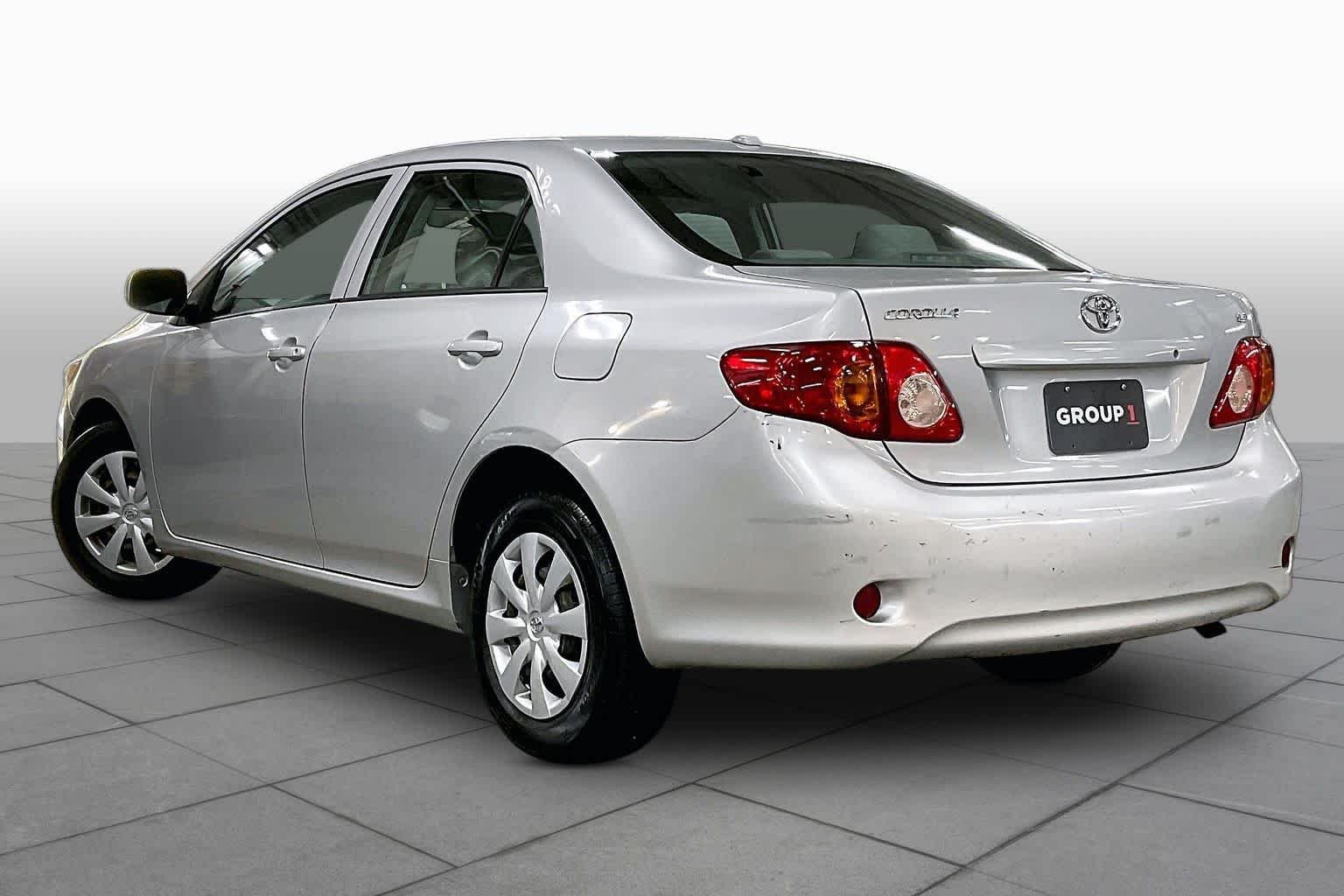Used 2010 Classic Silver Metallic Toyota LE image 11