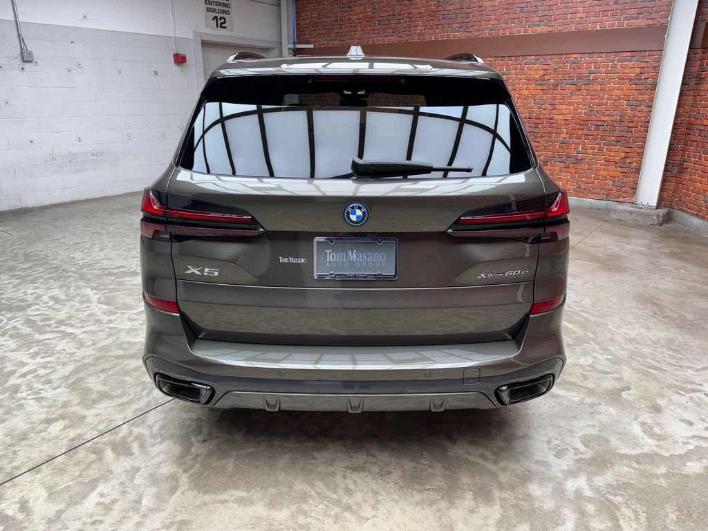 New 2026 Green BMW xDrive50e image 4