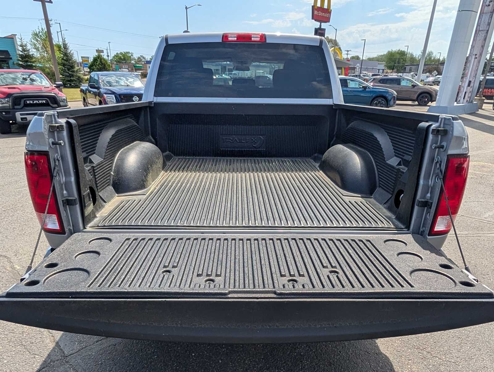 Used 2022 Billet Silver Metallic Clearcoat Ram SLT image 16