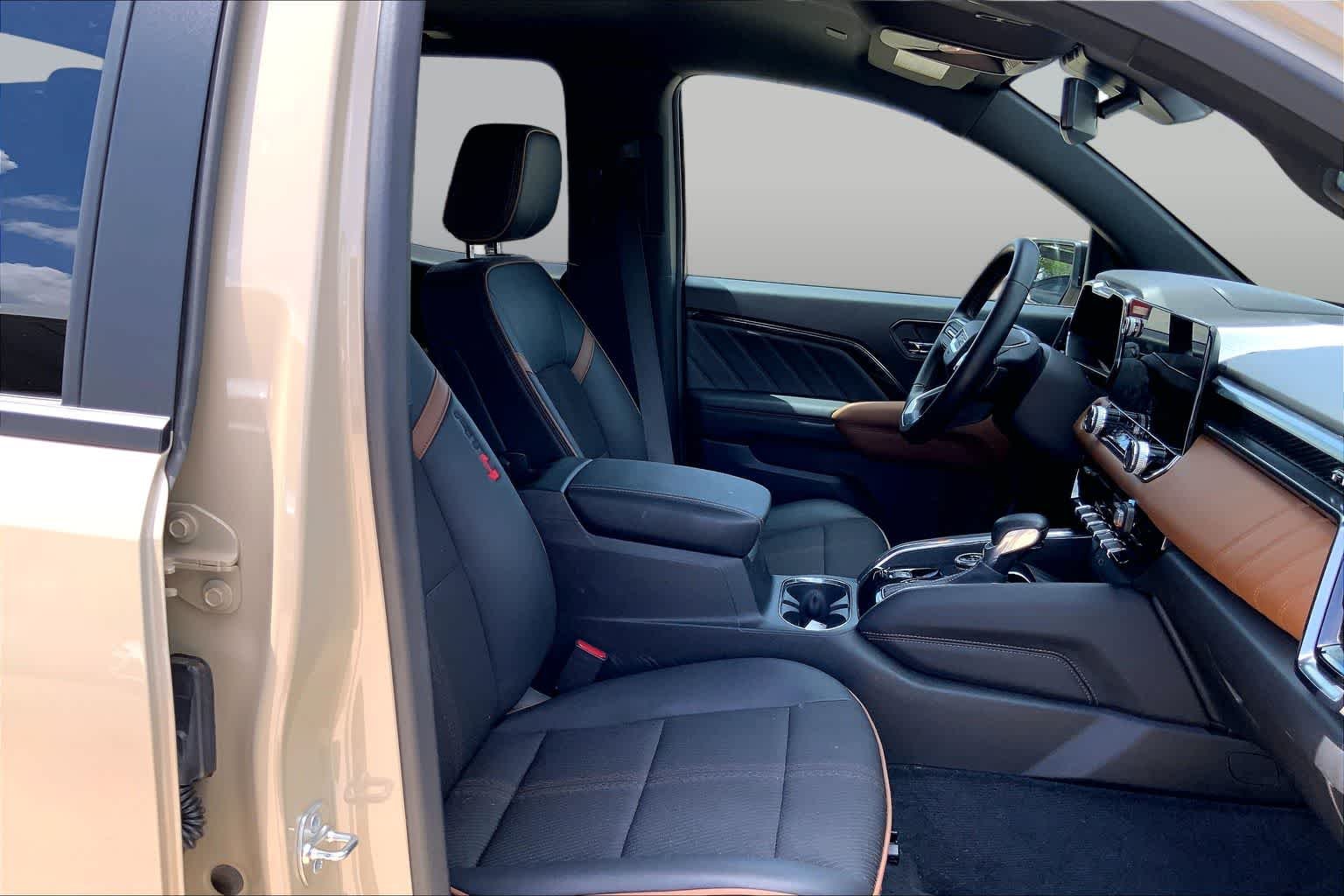 Used 2024 Desert Sand Metallic GMC 4WD AT4 image 9
