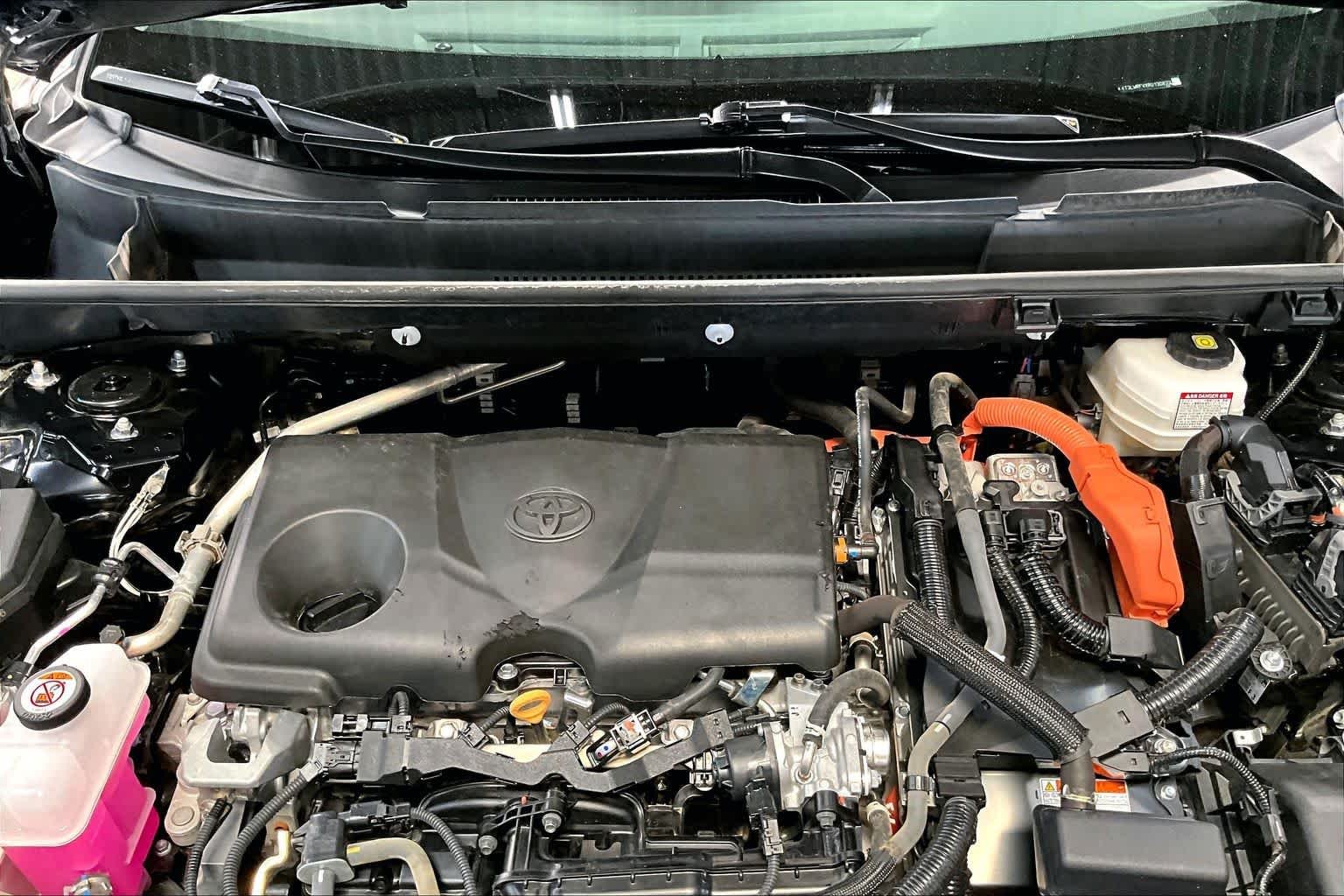 Used 2024 Midnight Black Metallic Toyota Hybrid LE image 31