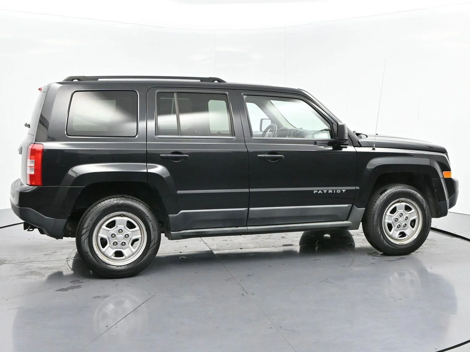 Used 2011 Brilliant Black Crystal Pearl Jeep Sport image 8