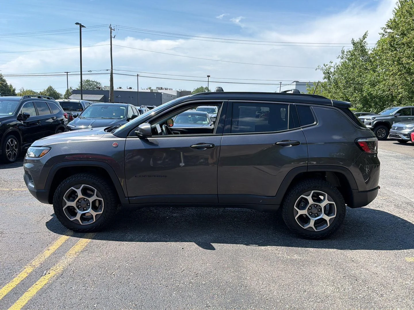 Used 2022 Granite Crystal Metallic Clearcoat Jeep Trailhawk image 6