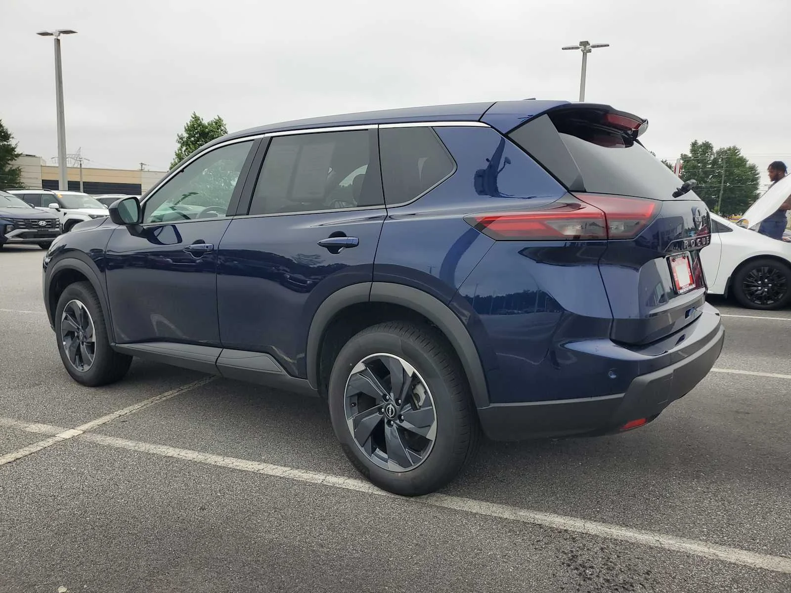 Used 2025 Deep Ocean Blue Pearl Nissan SV image 4