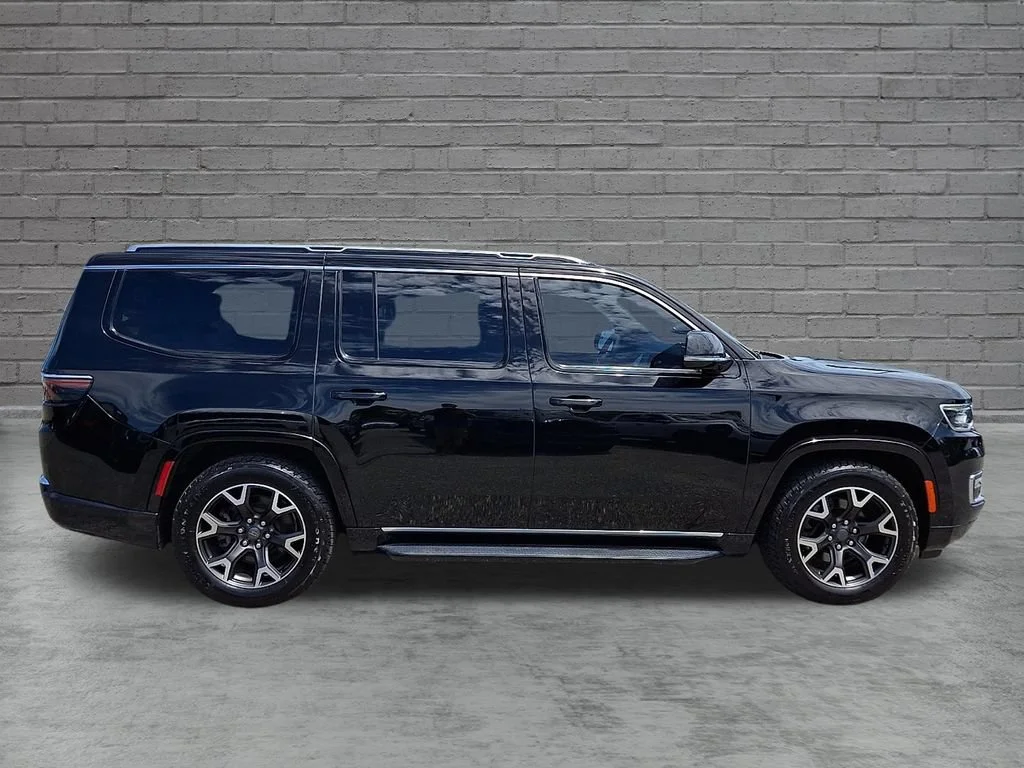 Used 2023 Diamond Black Crystal Pearlcoat Jeep Series III image 13