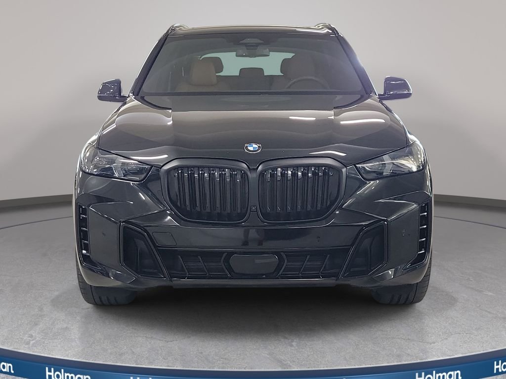 Certified Used 2025 Black Sapphire Metallic BMW sDrive40i image 3