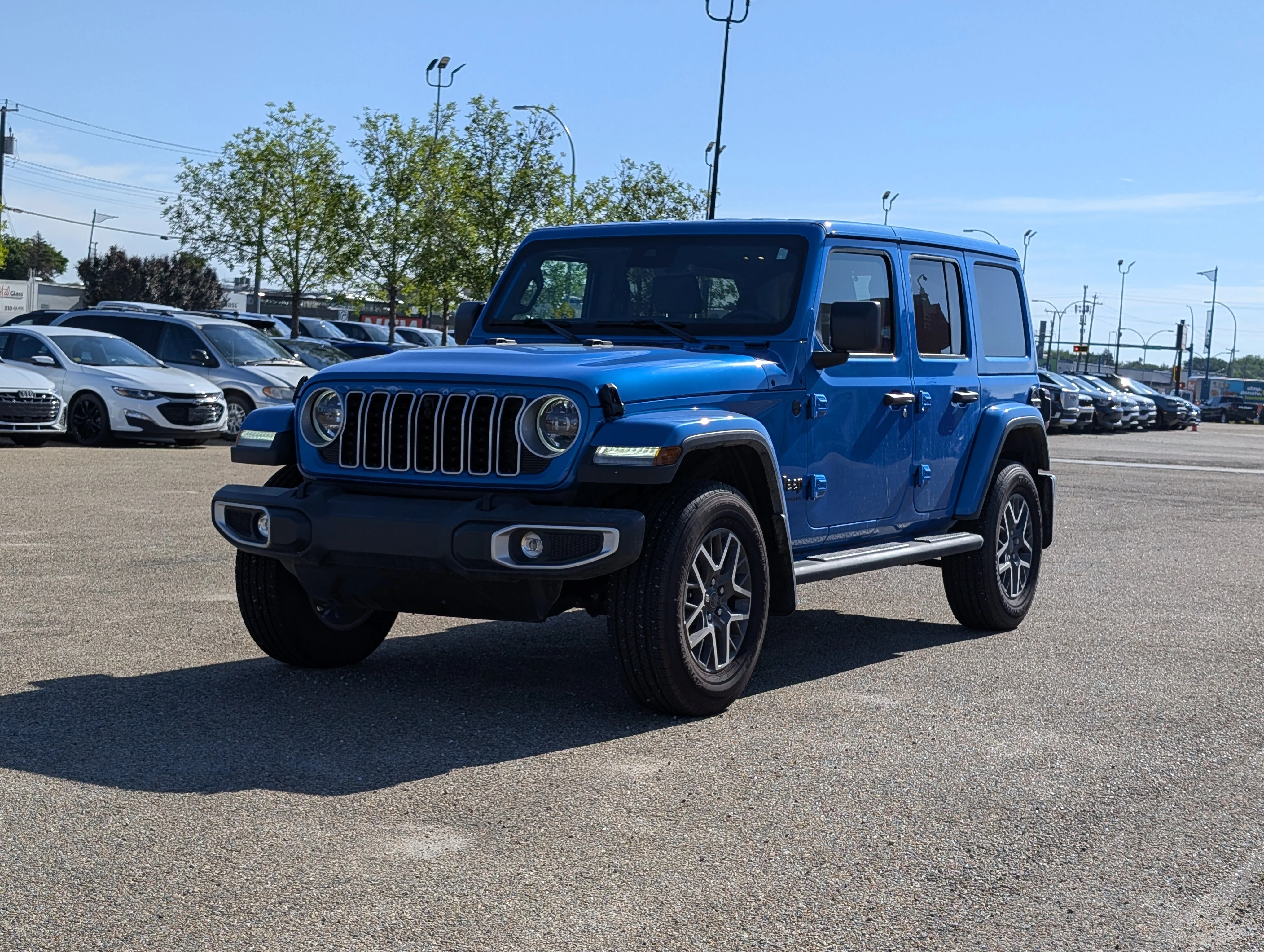 New 2025 Hydro Blue Pearl Jeep Sahara image 2