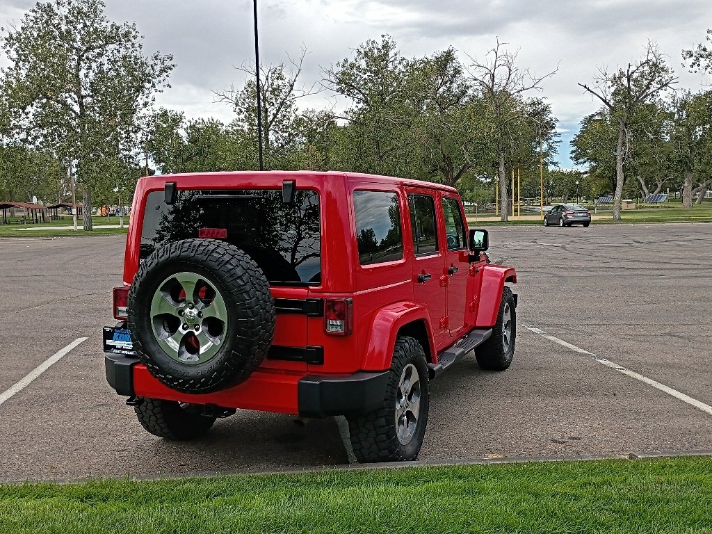 Used 2017 Firecracker Red Clearcoat Jeep Sahara image 5