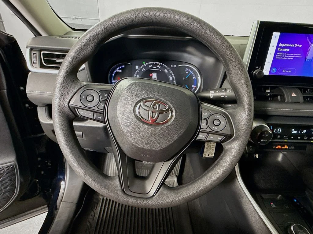 Used 2024 Midnight Black Metallic Toyota Hybrid LE image 12